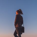 female-cyclist-climbing-mountain-2