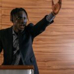 French-politician-speaking-conference